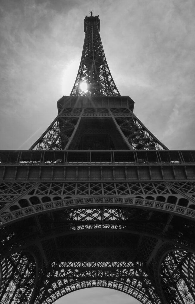 looking up at the Eiffel Tower