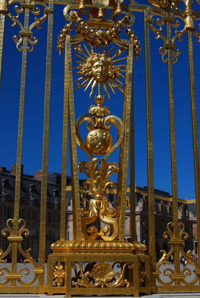 The gold entry gates to Versailles