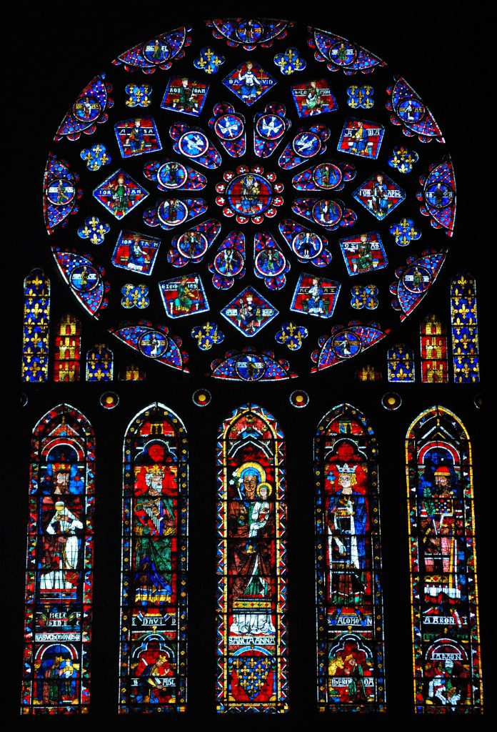 The north rose window, which is one of three rose windows in the church. This window tells stories of the Old Testament and the birth of the Virgin Mary.