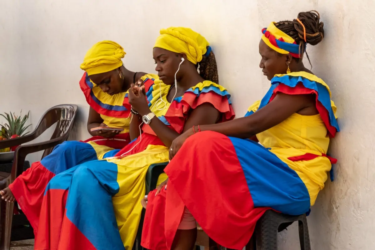 women in colorful local dresses in Cartagena Columbia