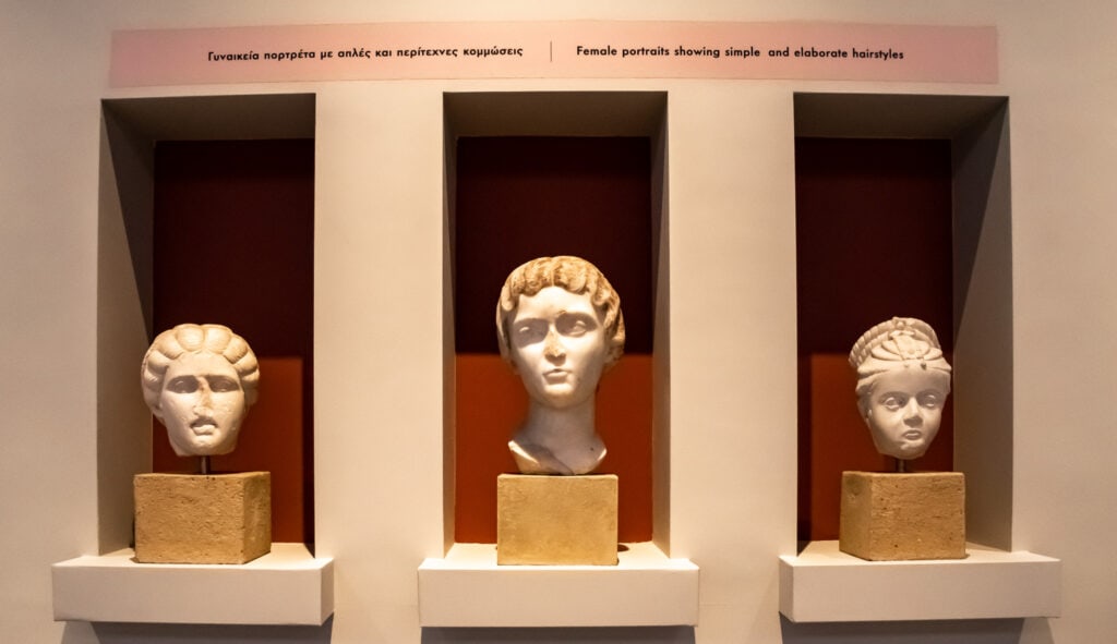 Sculptures showing different women's hairstyles in antiquity