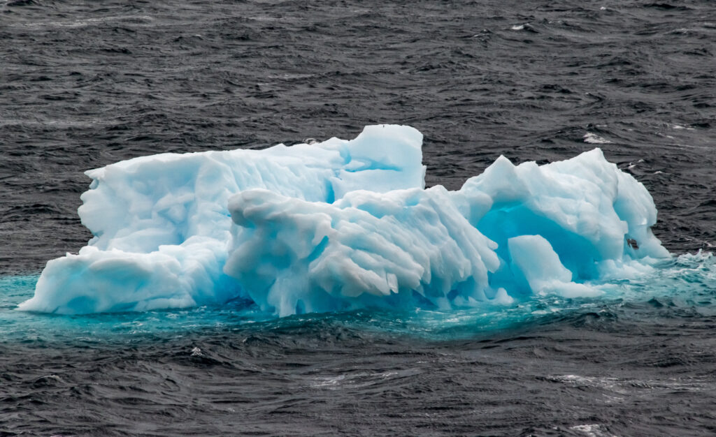 The bright blue color in an ice berg indicates the ice is very old