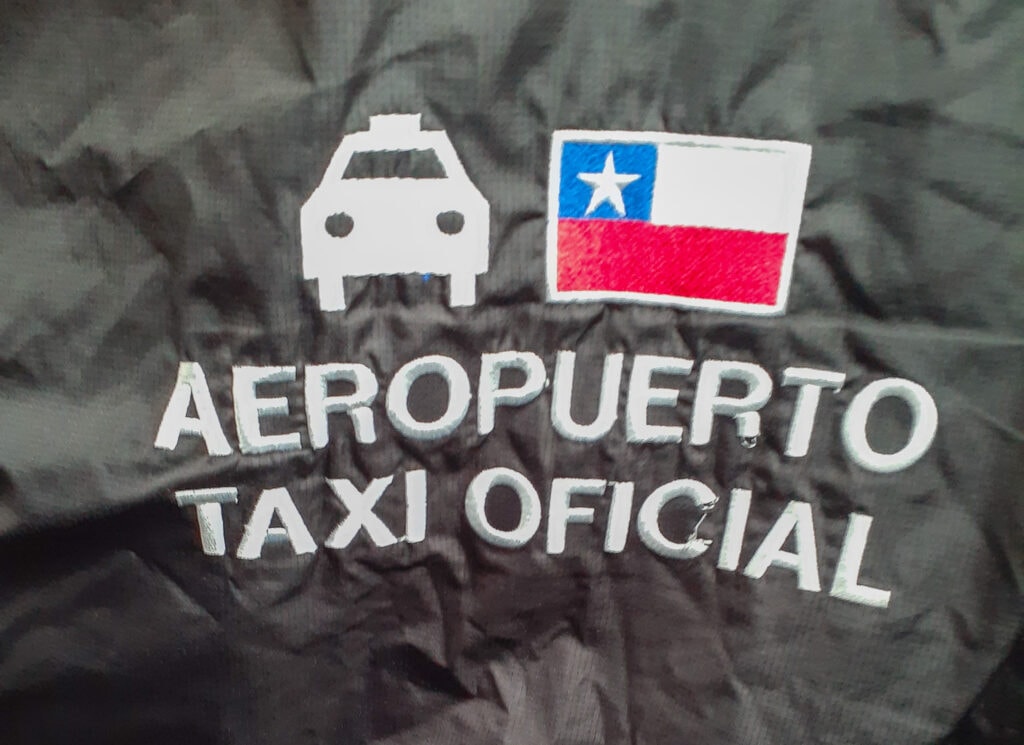 Insignia of official airport taxi in Santiago