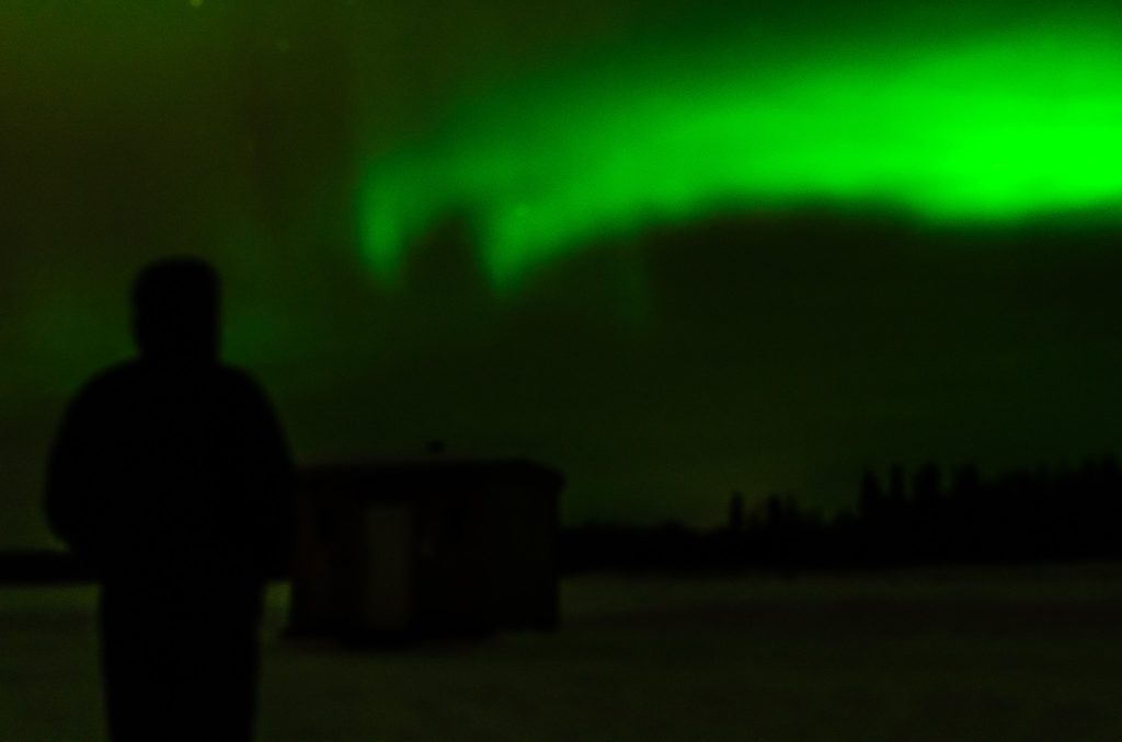 Watching the Northern Lights on frozen Lake Chena