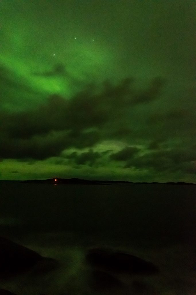 My camera picked up a strong aurora through the clouds, though I could not see it with my eyes