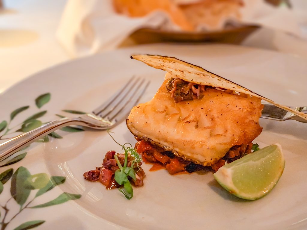 Seared sea bass served with Sicilian caponata