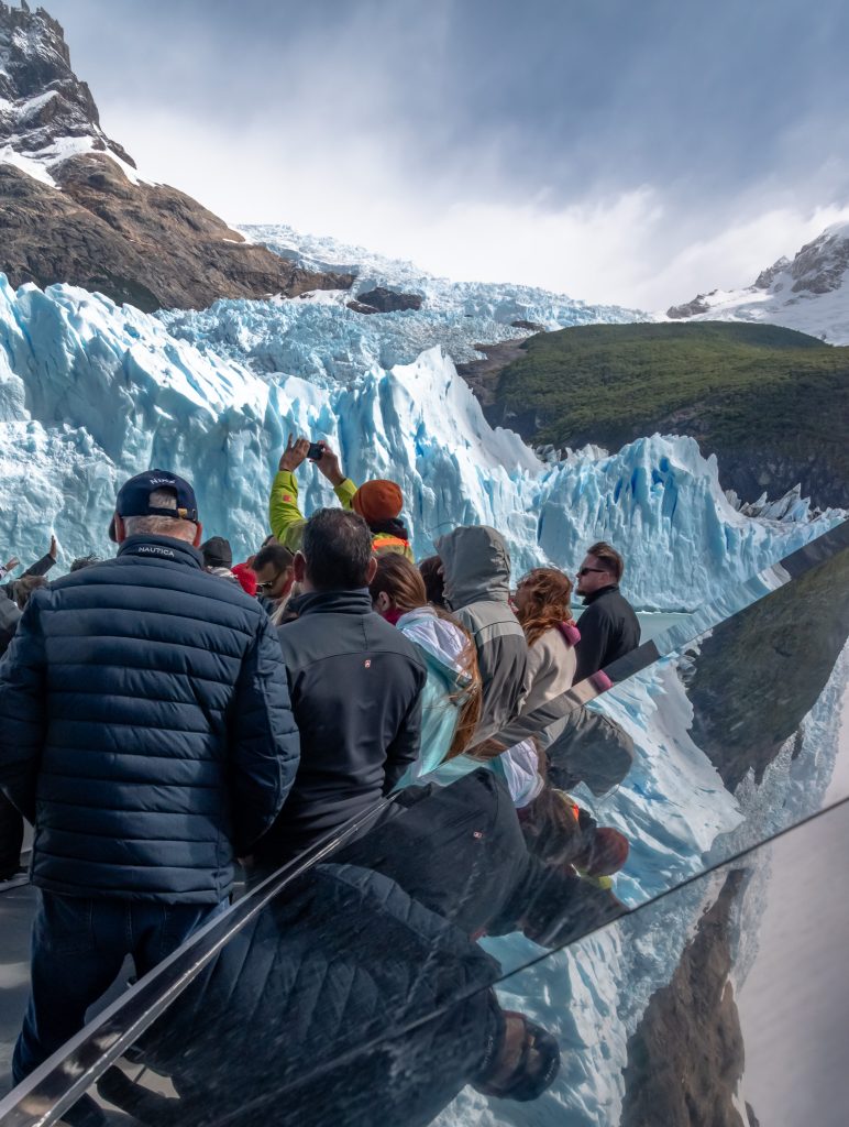 The front of the boat was quite crowded as guests jostled for photos of the glacier