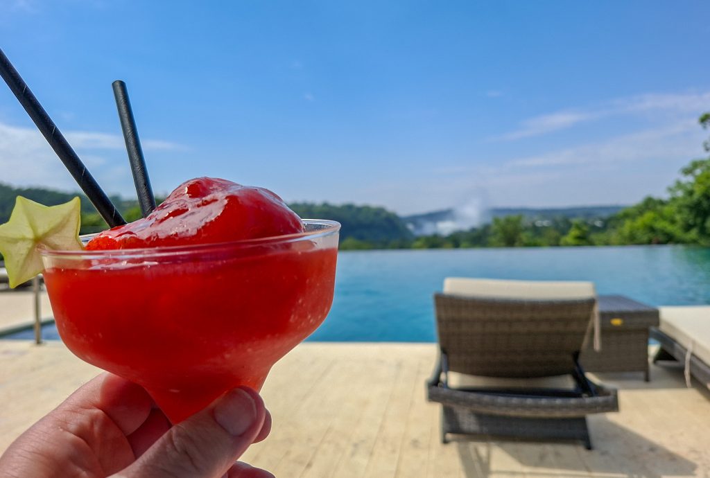 A refreshing strawberry daiquiri by the pool