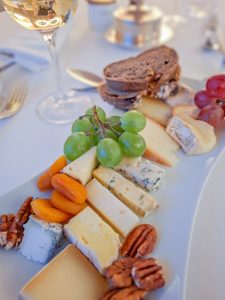 My plate is filled with French cheeses