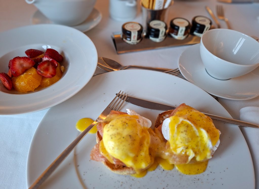 Eggs benedict for breakfast in the dining room on the L'Austral