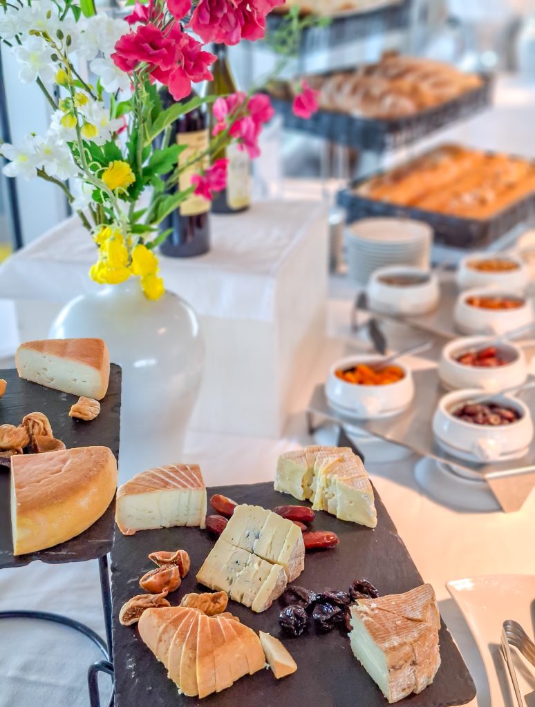 Cheese, fruit and nut table with French bread