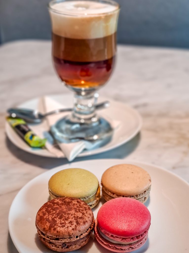 Hot Irish coffee and macarons