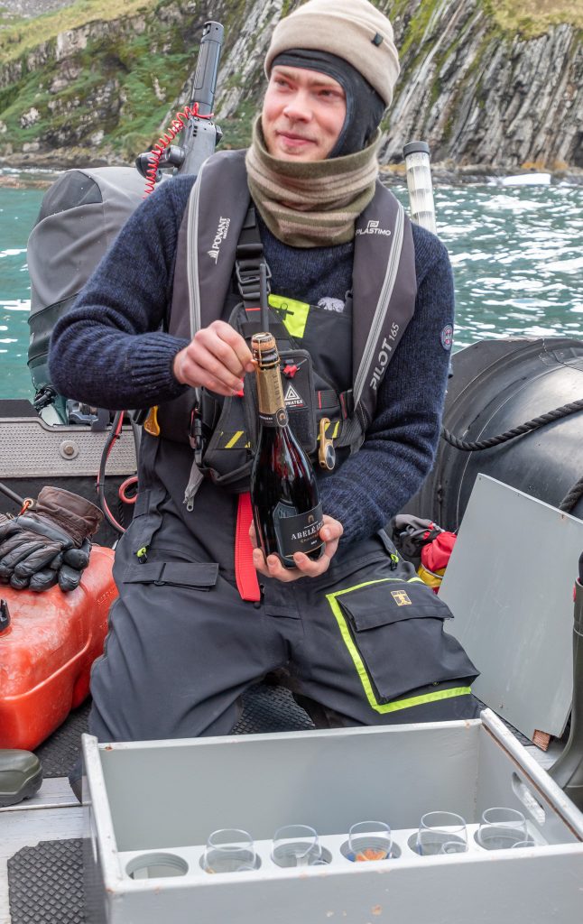 Celebrating the last day on South Georgia Island with champagne