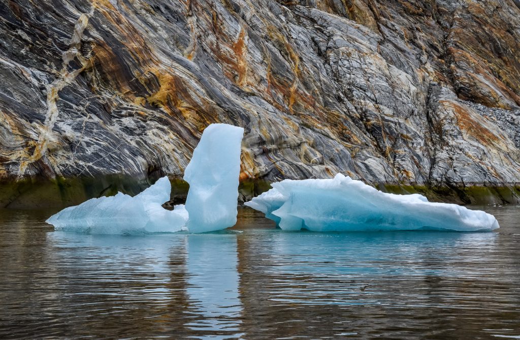 Ancient blue icebergs and striated granite