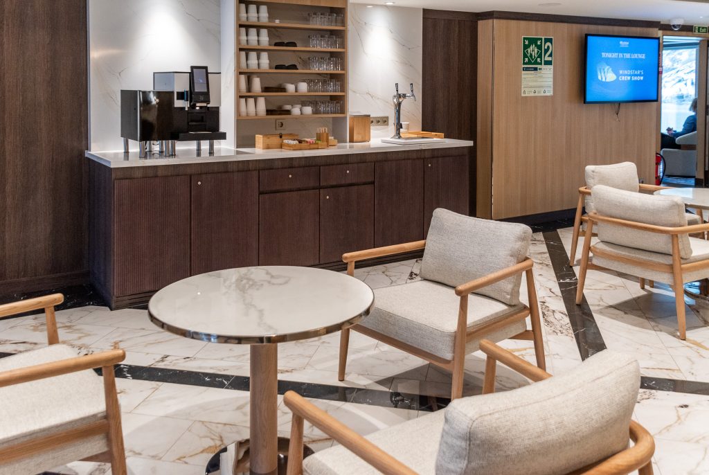 All say coffee and tea station with comfy seating