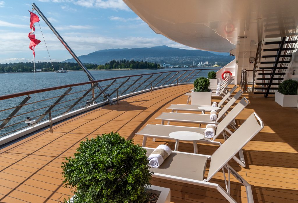 outdoor lounging and viewing space at the back of the ship on deck 6