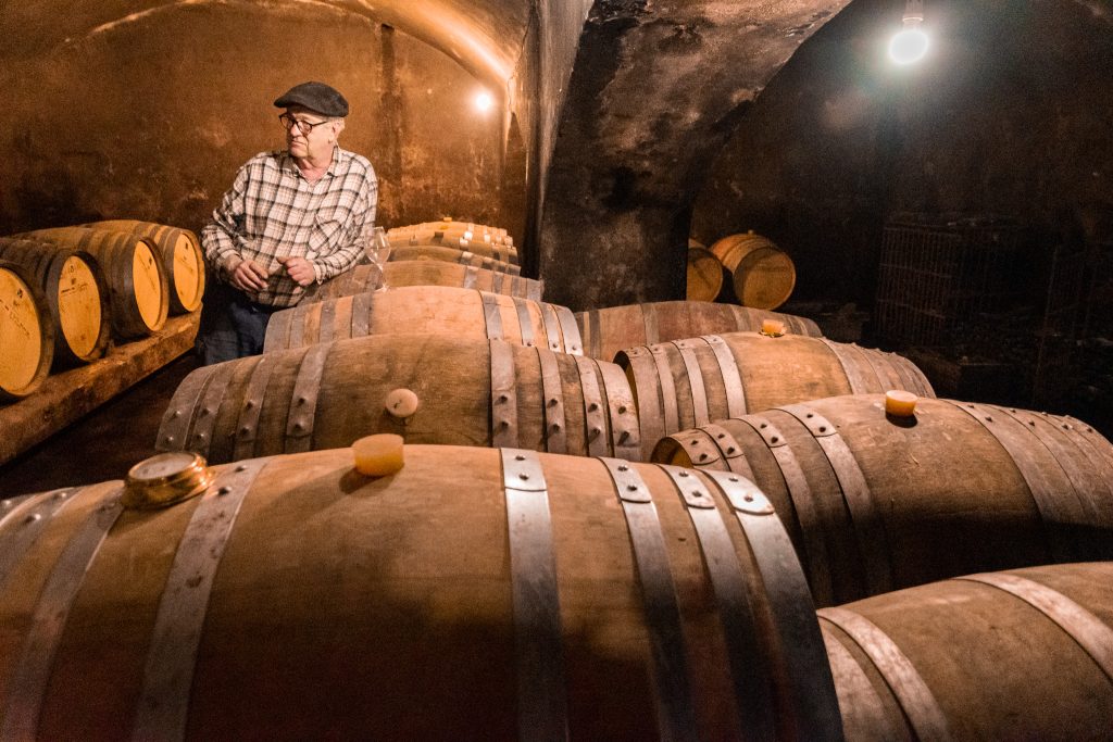 Xavier Gombart in his wine cellar