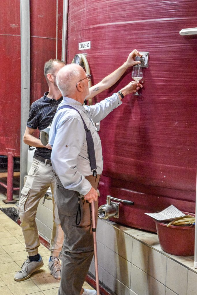 Sampling wine that is in production